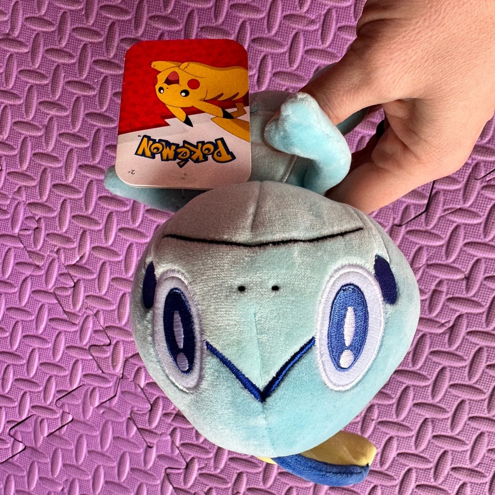 4 Pokémon stuffed animals with tags